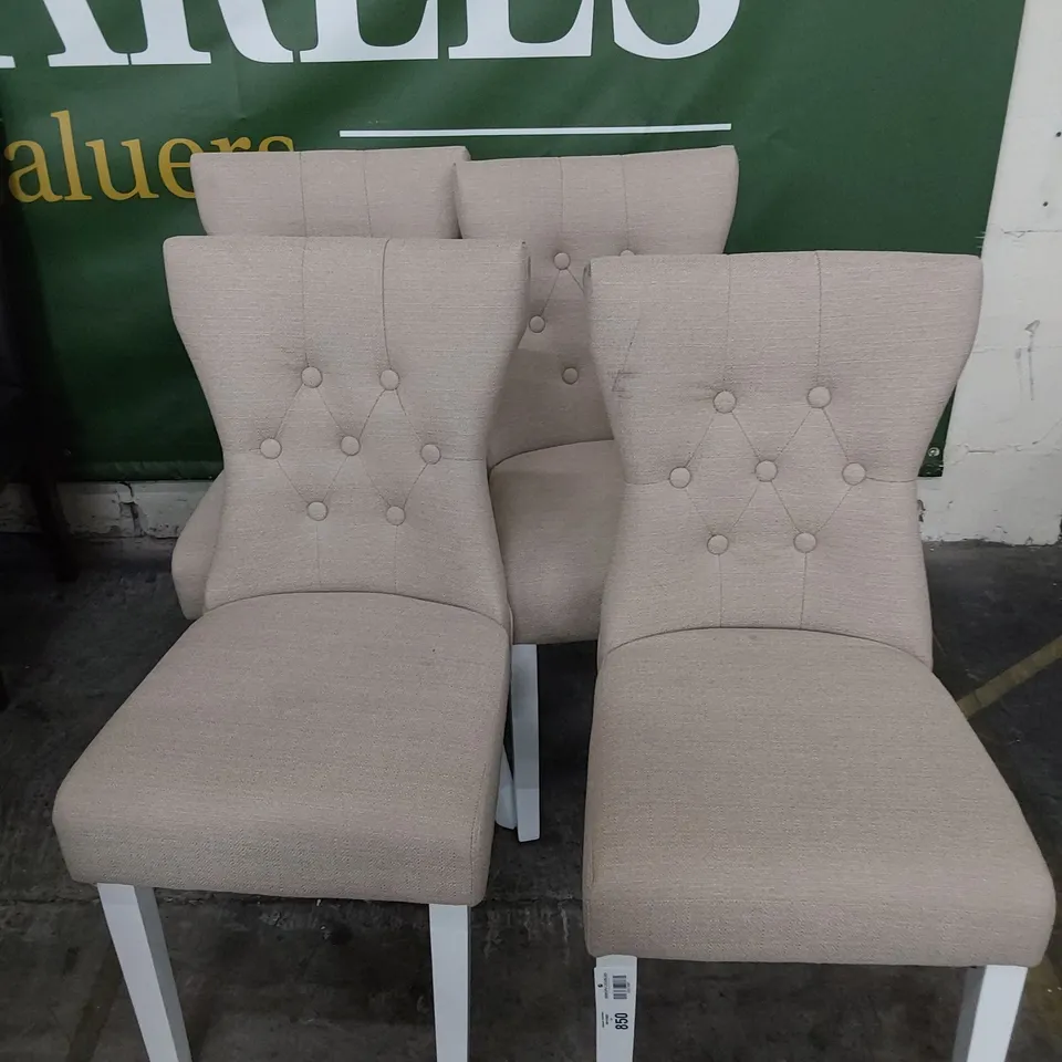 SET OF FOUR DESIGNER UPHOLSTERED BUTTONED BACK DINING CHAIRS NATURAL FABRIC ON WHITE LEGS 