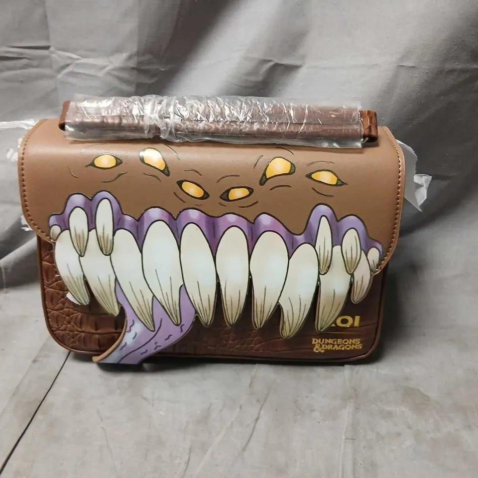 KOI DUNGEONS & DRAGONS HANDBAG WITH MONSTER MOUTH ARTWORK