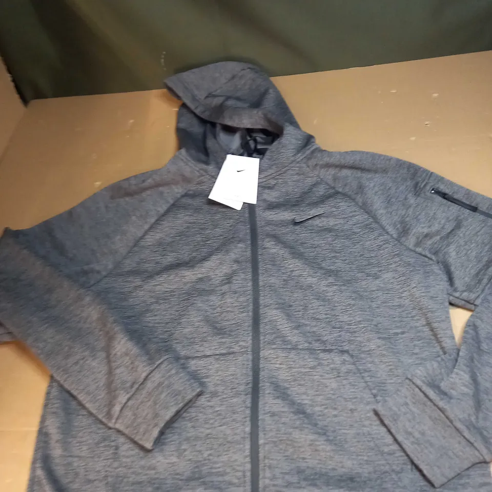 NIKE FULL ZIPPED JACKET SIZE M