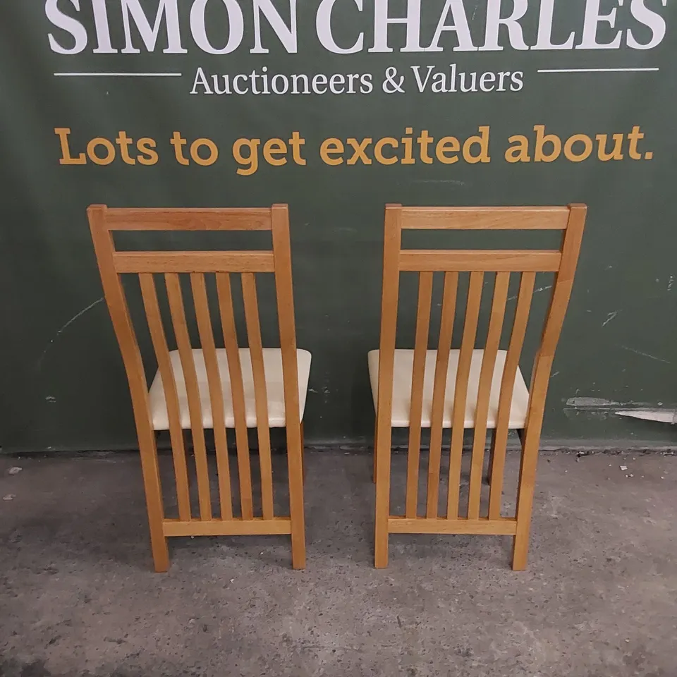 SET OF 2 BALI OAK DINING CHAIRS WITH IVORY SEAT PADS
