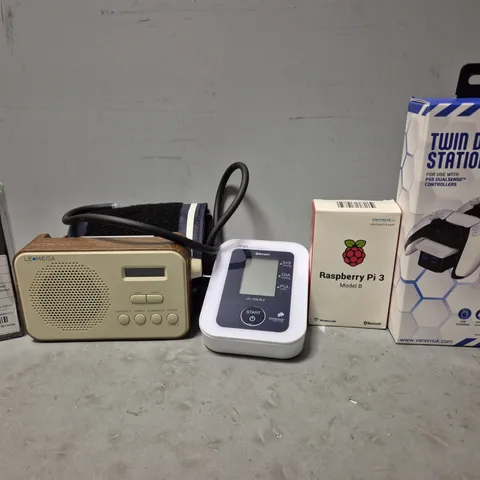 TOTE OF APPROXIMATELY 9 ASSORTED ITEMS TO INCLUDE - RASPBERRY PI MODEL B , VENOM TWIN DOCKING STATION , LE MEGA RADIO ETC