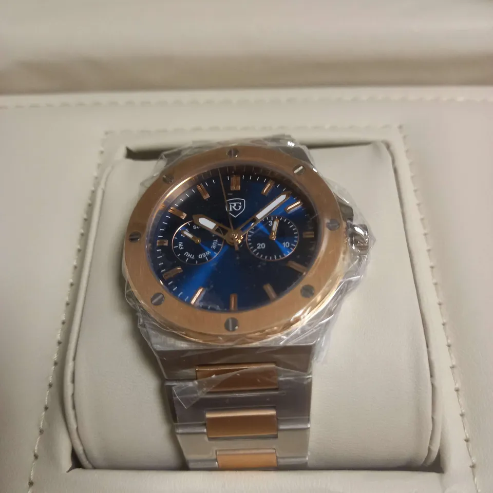 BOXED RAYMOND GAUDIN WATCH IN BLUE/GOLD/SILVER