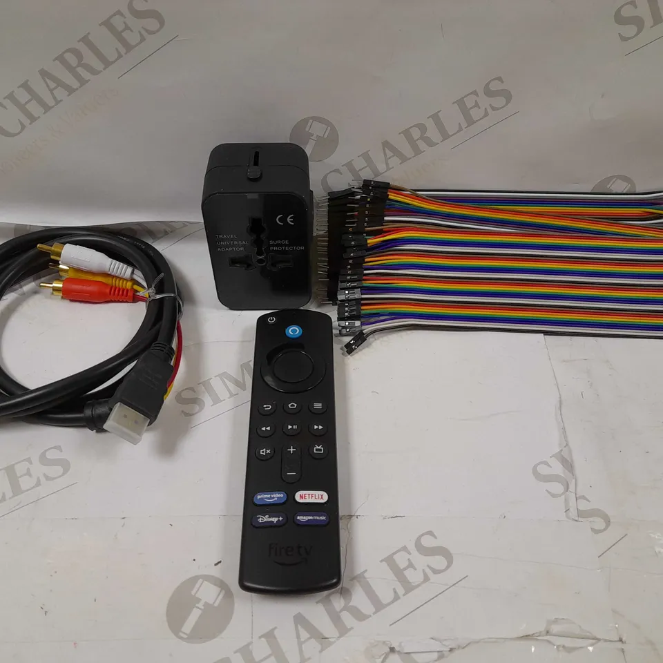 LOT OF APPROX 20 ASSORTED ELETRICAL ITEMS-AMAZON FIRE STICK REMOTE-TRAVEL PLUG-AUDIO CABLES