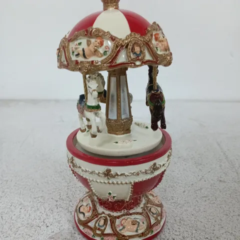 HEAVEN SENDS EGG SHAPED MERRY GO ROUND CHRISTMAS DECORATION