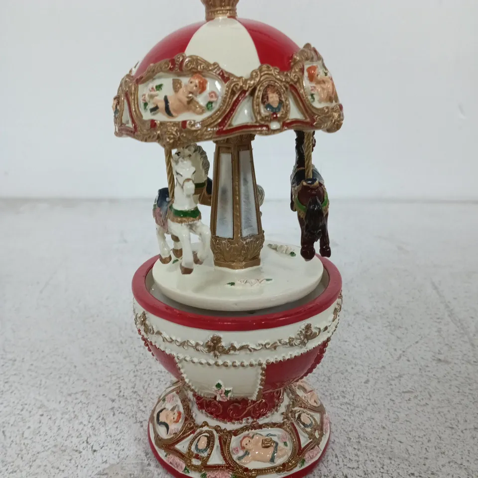 HEAVEN SENDS EGG SHAPED MERRY GO ROUND CHRISTMAS DECORATION