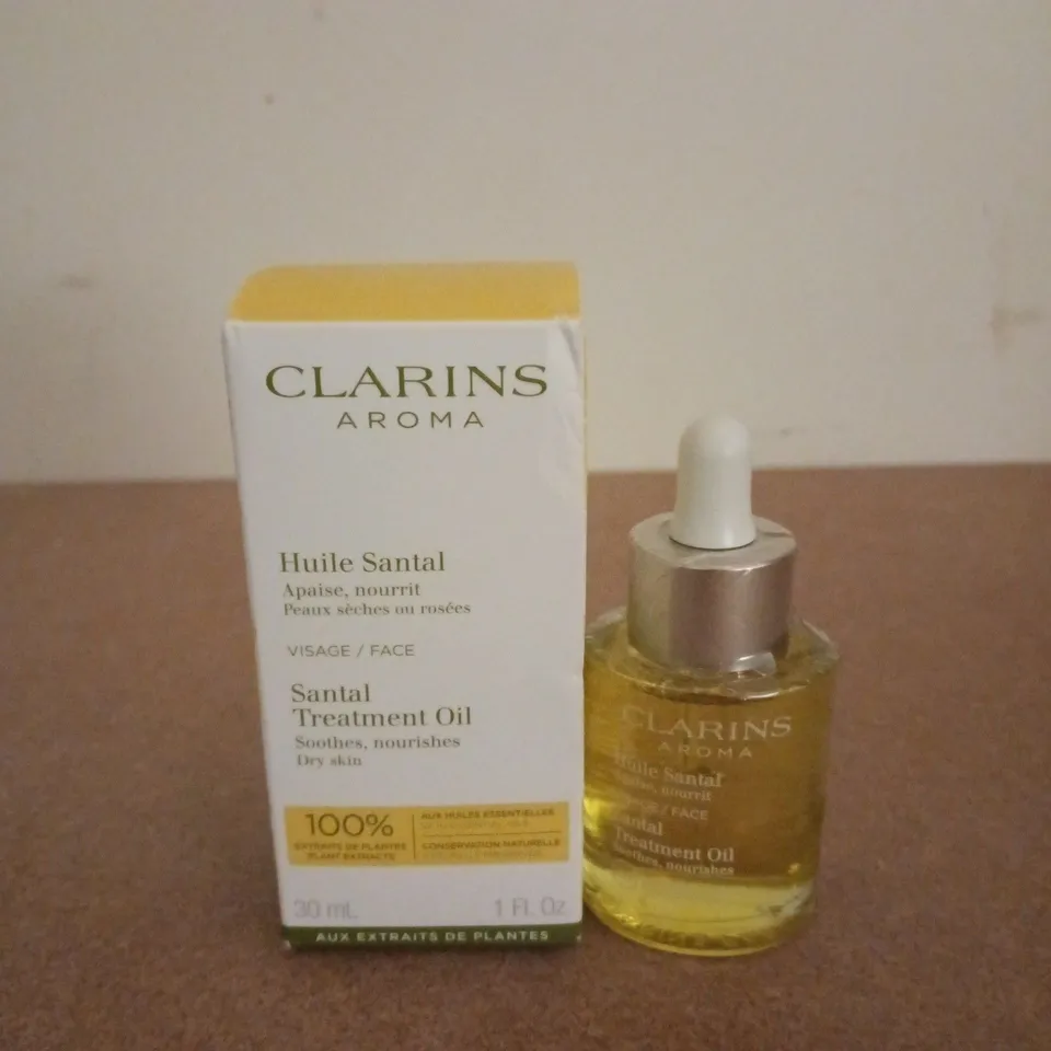 BOXED CLARINS AROMA SANTAL TREATMENT OIL (30ML)