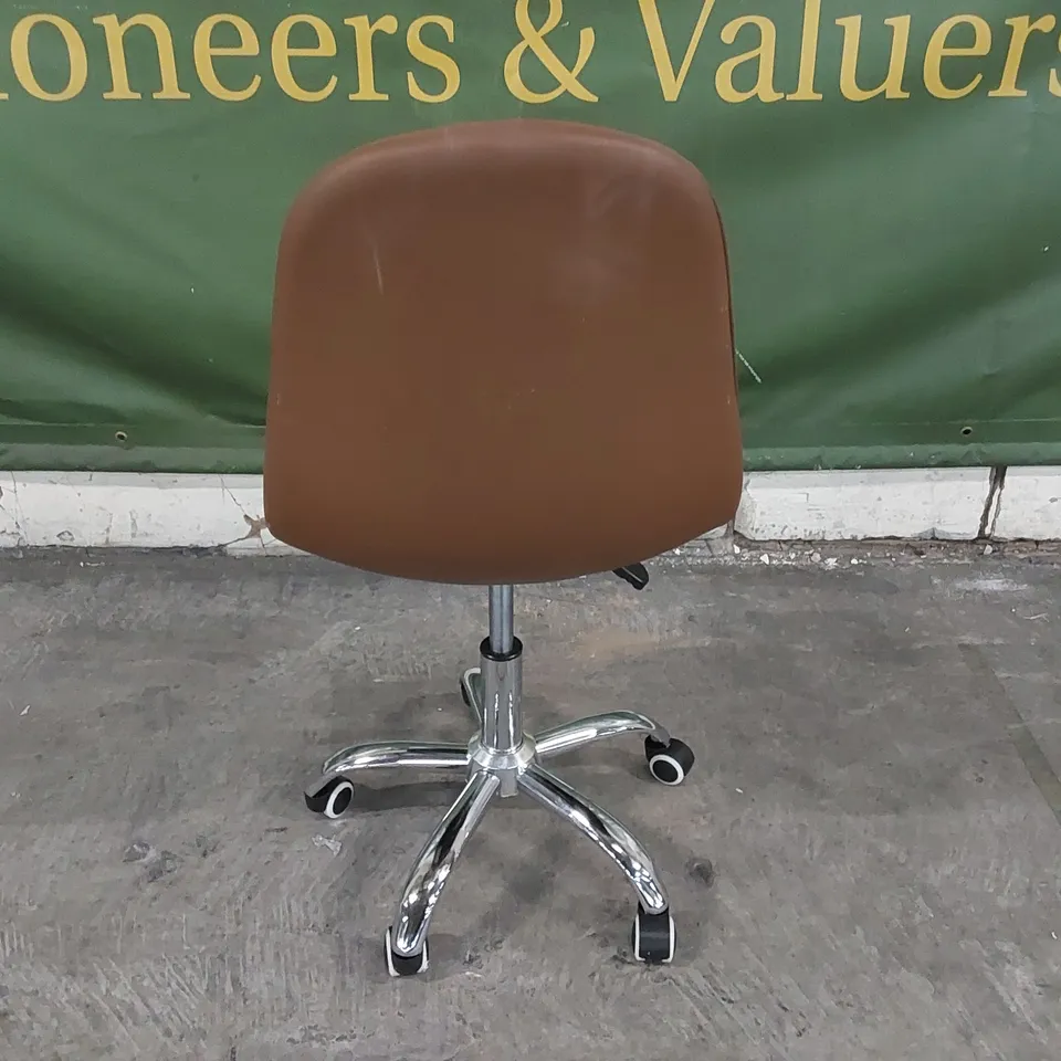 DESIGNER BROWN SWIVEL CHAIR WITH CHROME BASE