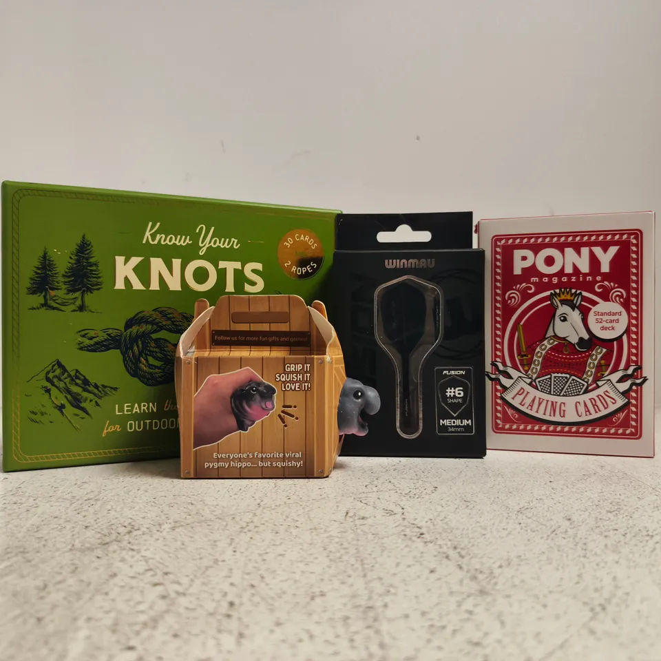 APPROXIMATELY 10 ASSORTED TOYS AND GAMES TO INCLUDE PONY MAGAZINE PLAYING CARDS, SQUISHY PYGMY HIPPO, ETC