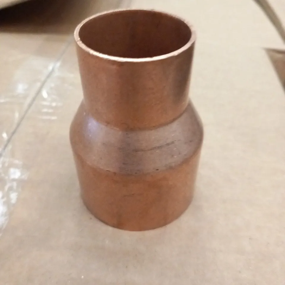 APPROXIMATELY 10 BOXES OF 12 CENTER COPPER REDUCERS 54MM TO 35MM(120 IN TOTAL)