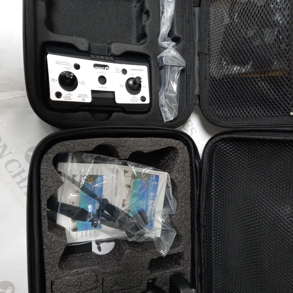 LOT OF 2 DRONE CONTROLLERS AND SPARE PARTS 