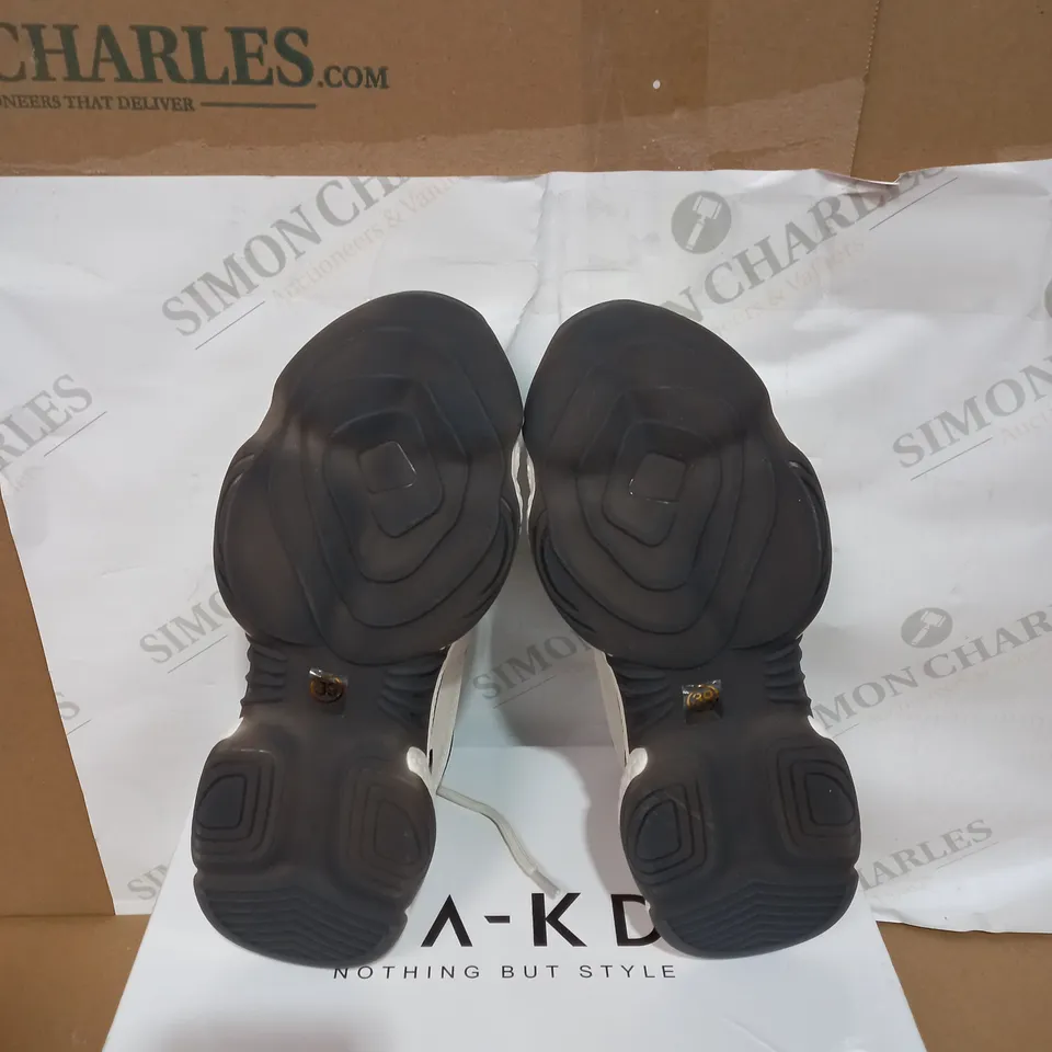 BOXED PAIR OF CUT OUT CHUNKY TRAINERS SIZE 39