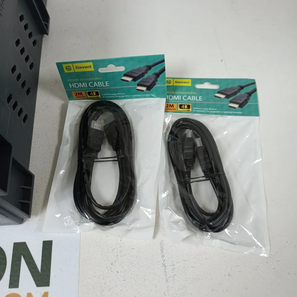 TOTE OF APPROXIMATELY 10 ASSORTED ITEMS TO INCLUDE: ASSORTED HDMI CABLES 