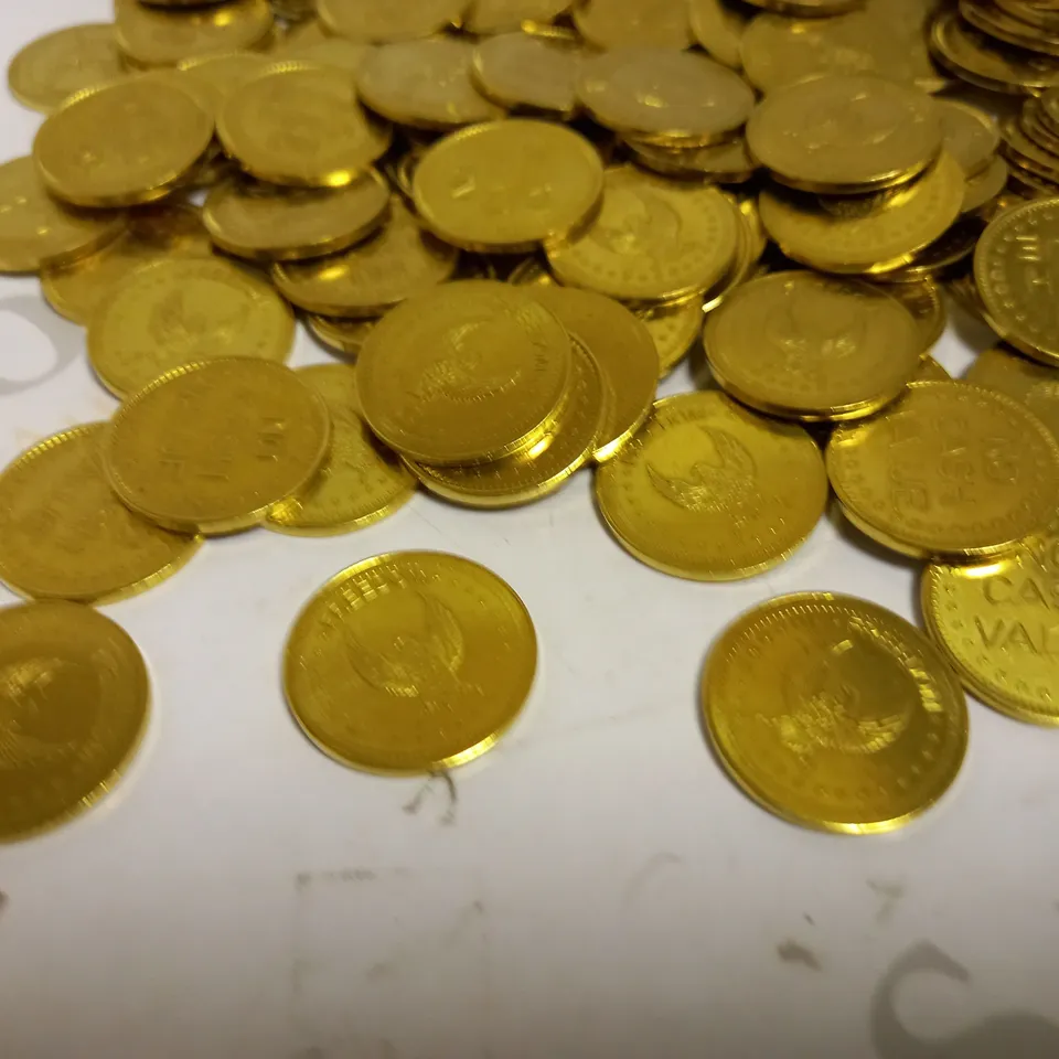 LOT OF APPROXIMATELY 175 EAGLE FREEDOM GOLD NO CASH VALUE TOKENS (FOR COIN METER, SUNBED TIMER, ETC)