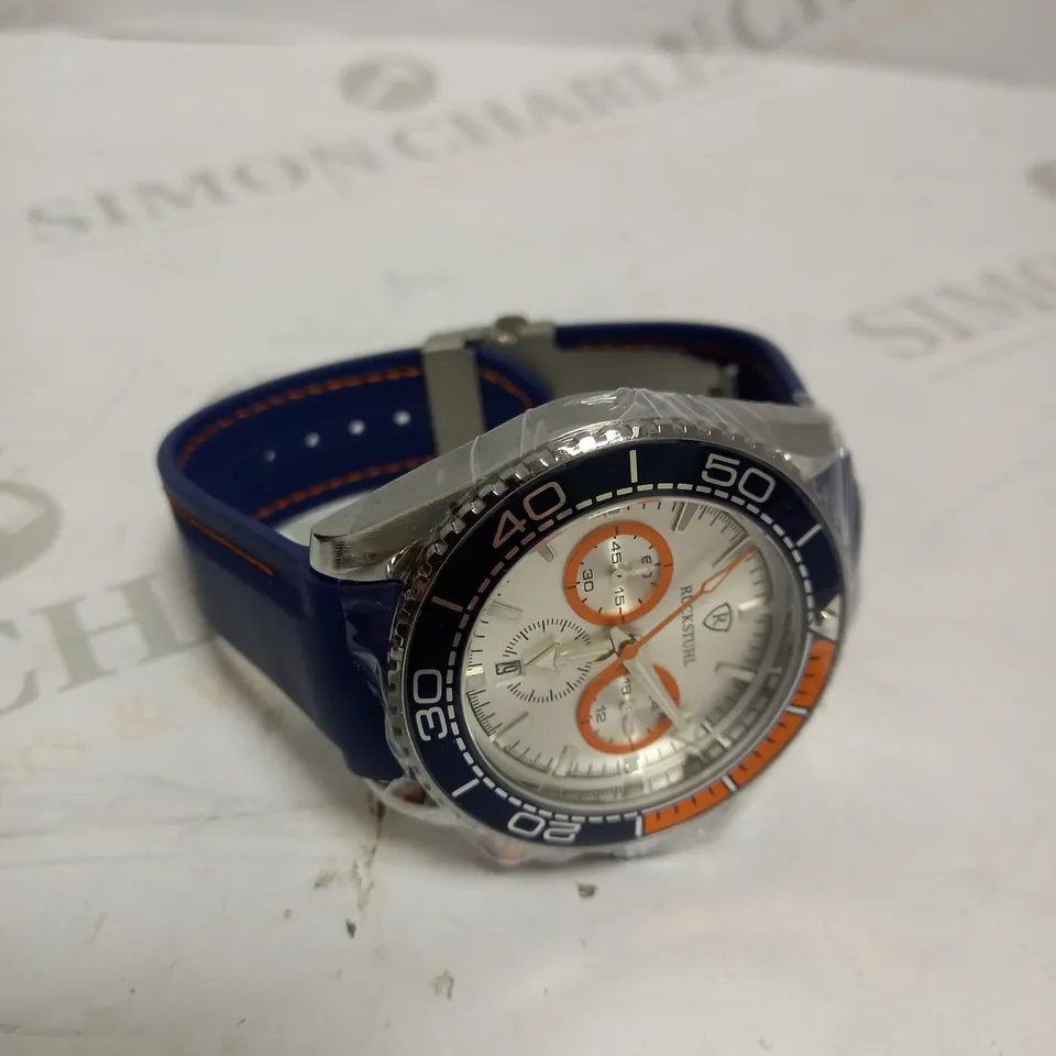 MEN’S RUCKSTUHL CHRONOGRAPH R400 WATCH – SILVER COLOUR CASE – SILVER DIAL – 3ATM WATER RESISTANT – BLUE RUBBER STRAP 