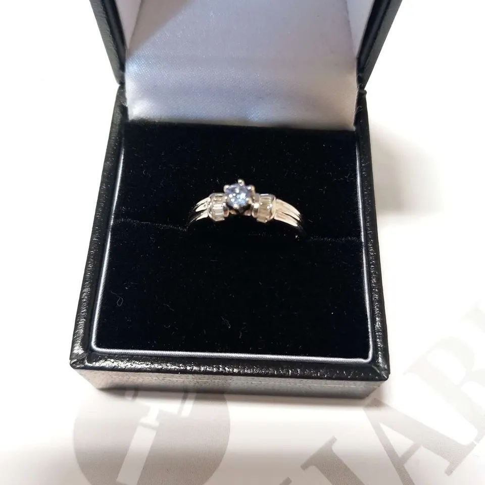 18CT HITE GOLD RING SET WITH A TANANITE AND NATURAL BAGUETTE DIAMONDS