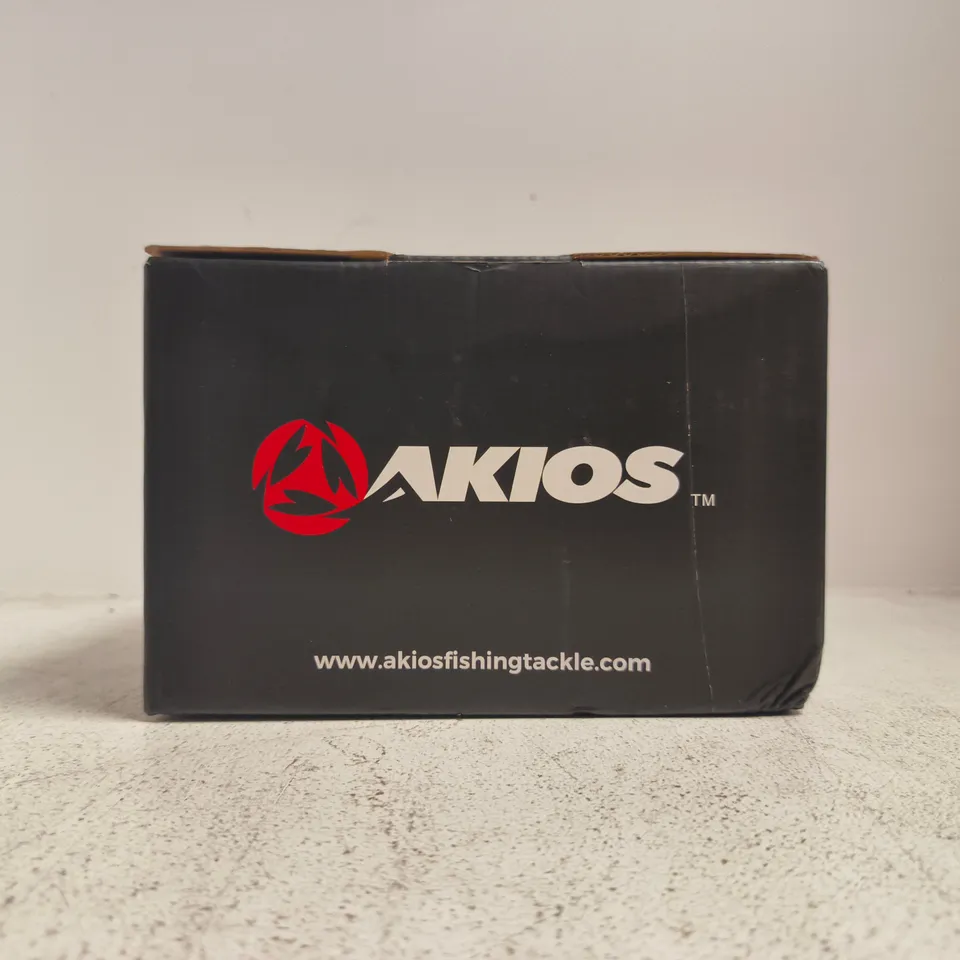 AKIOS SPINNING FISHING REEL – BLACK WITH PURPLE TRIM (BOXED)
