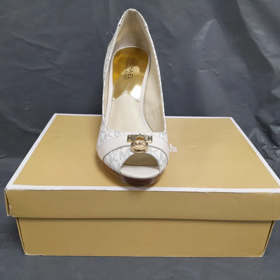 BOXED PAIR OF MICHAEL KORS HAMILTON WEDGE SHOES IN CREAM SIZE EU 41