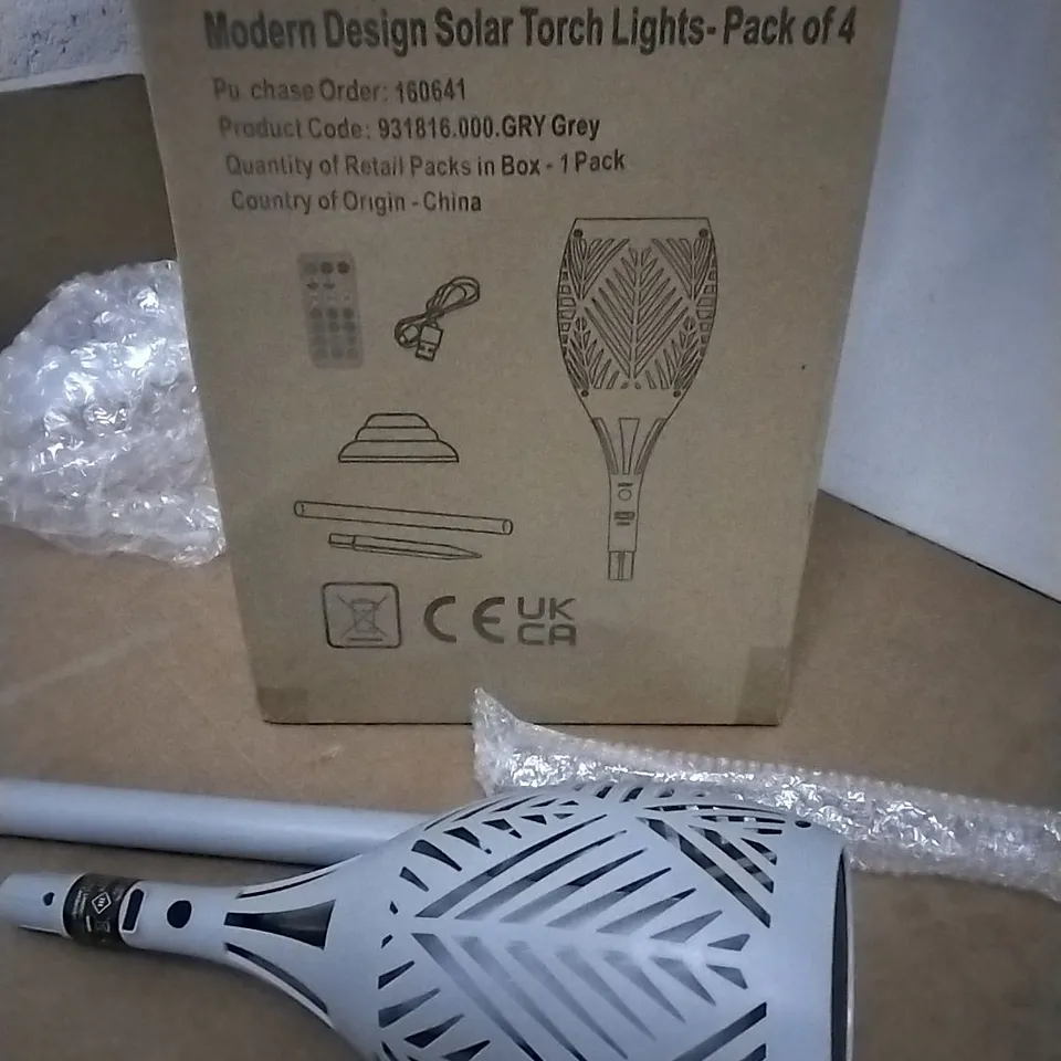 BOXED SET OF FOUR LED SOLAR TORCH LIGHTS