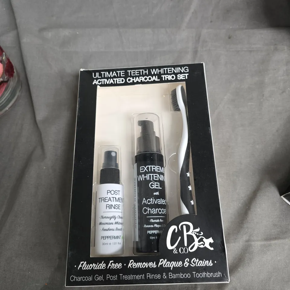 BOX OF APPROXIMATELY 25 ASSORTED ITEMS TO INCLUDE: TEETH WHITENING KIT AND CANDLE