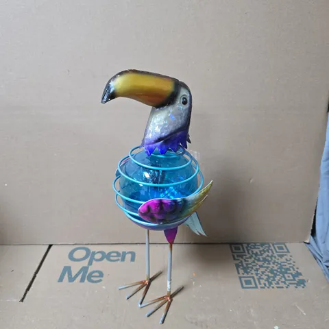 BOX OF APPROXIMATELY 6 COLOURFUL METAL GARDEN BIRD ORNAMENT WITH WIRE CAGE AND GLASS ORB – DECORATIVE SCULPTURE