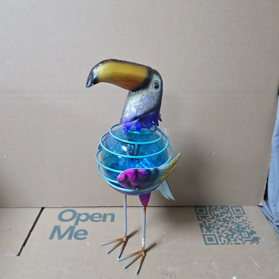 BOX OF APPROXIMATELY 6 COLOURFUL METAL GARDEN BIRD ORNAMENT WITH WIRE CAGE AND GLASS ORB – DECORATIVE SCULPTURE 