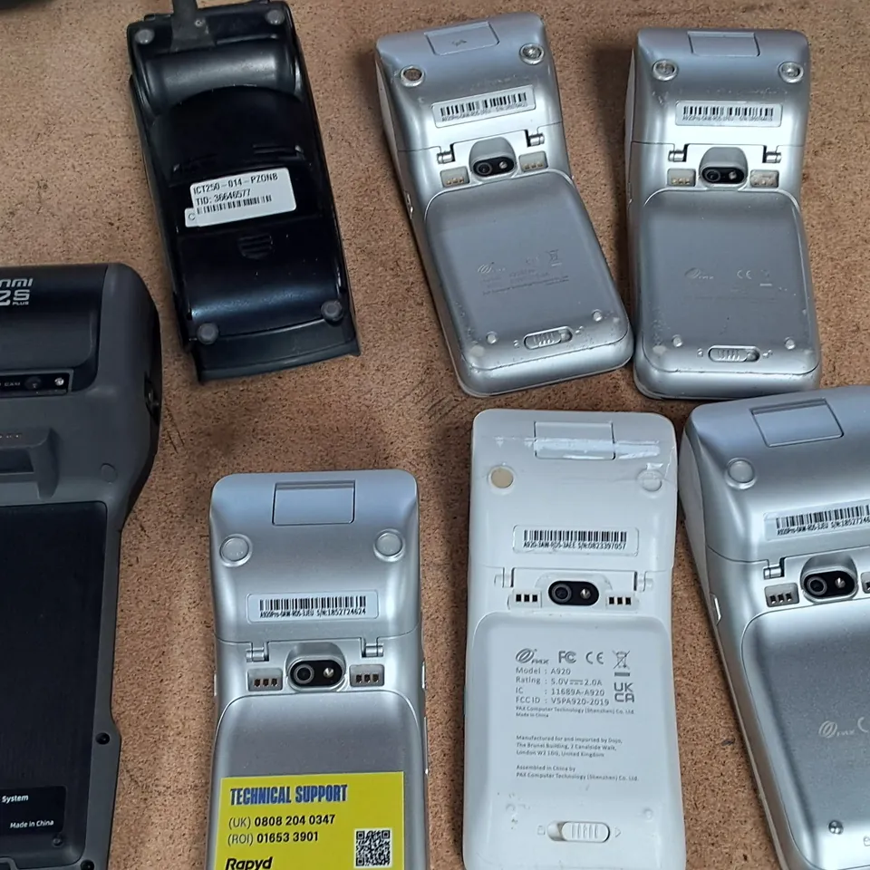 LOT OF 7 ASSORTED HAND HELD PAYMENT TERMINALS TO INCLUDE SUMNI V2S PLUS AND PAX A920 PRO