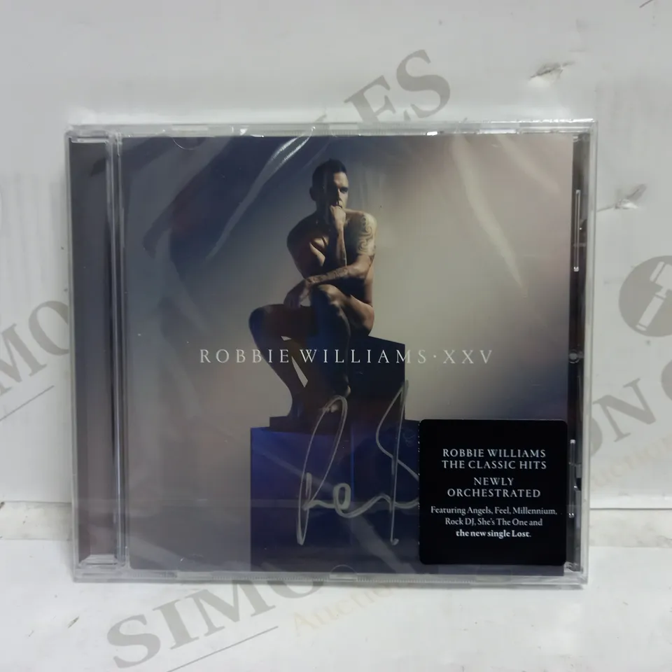 ROBBIE WILLIAMS XXV SIGNED ALBUM
