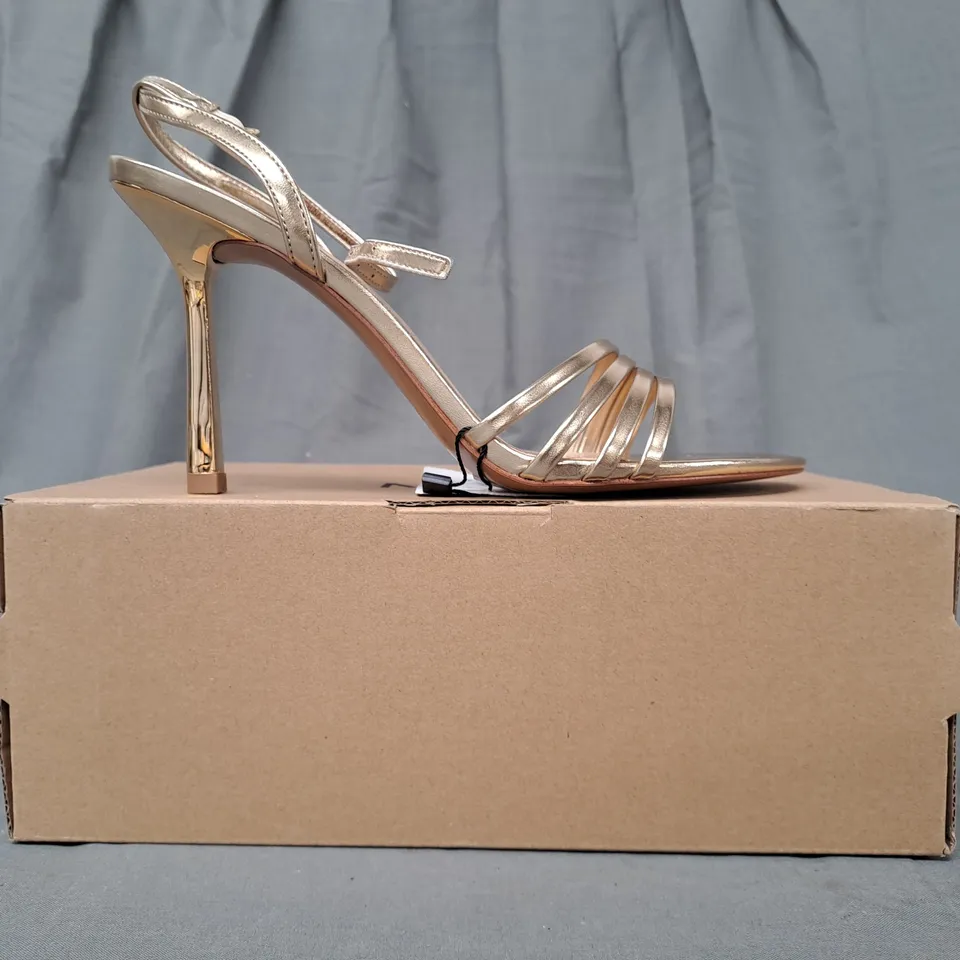 BOXED PAIR OF MNG OPEN TOE HIGH HEEL SANDALS IN METALLIC GOLD UK SIZE 6