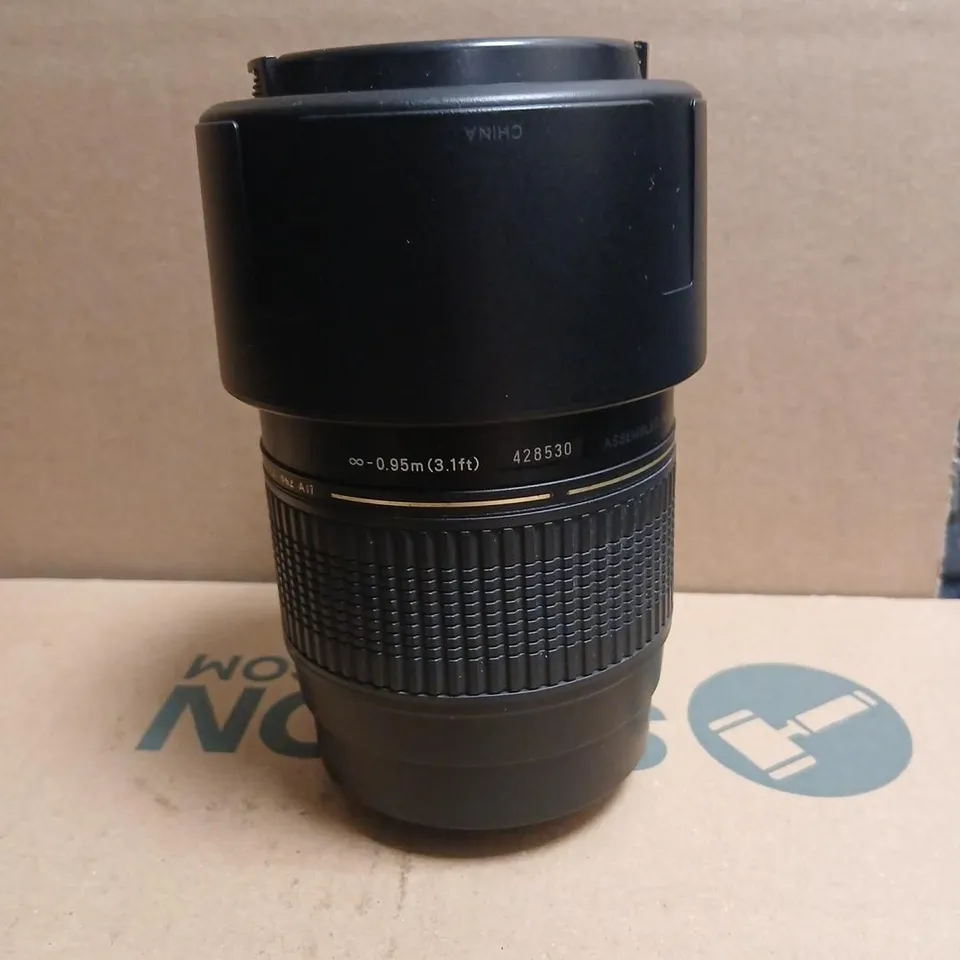 CANON EOS DSLR WITH 18-55MM KIT LENS AND TAMRON 70-300MM LENS – INCLUDES CAPS, HOODS AND CARRY BAG