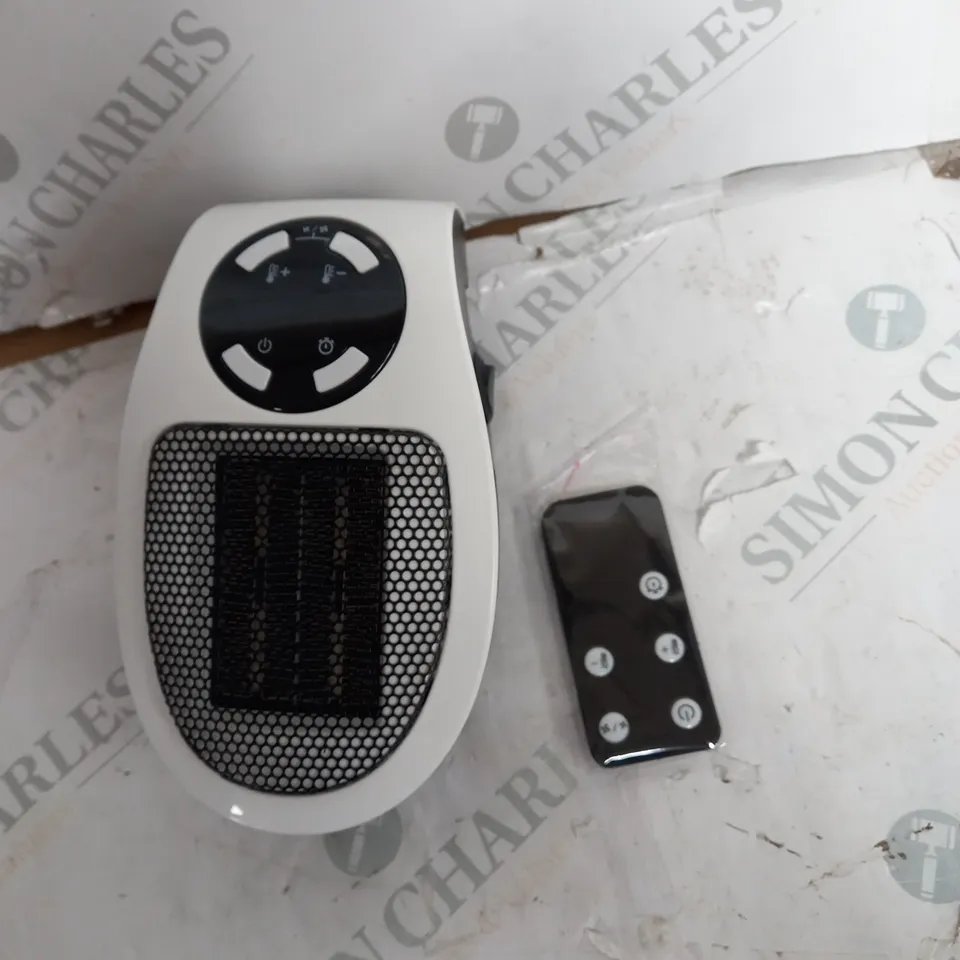 BOXED DAEWOO 500W PLUG IN HEATER WITH REMOTE CONTROL