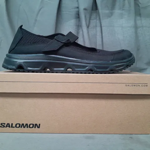 BOXED PAIR OF SALOMON RX MARIE-JEANNE SHOES IN BLACK UK SIZE 11