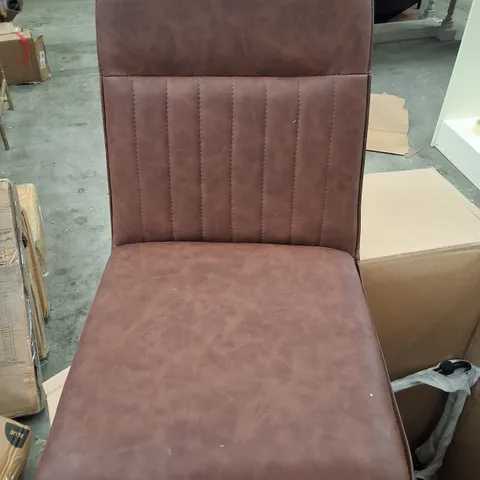 PAIR OF BROWN FAUX LEATHER DINING CHAIRS WITH BLACK METAL BASE
