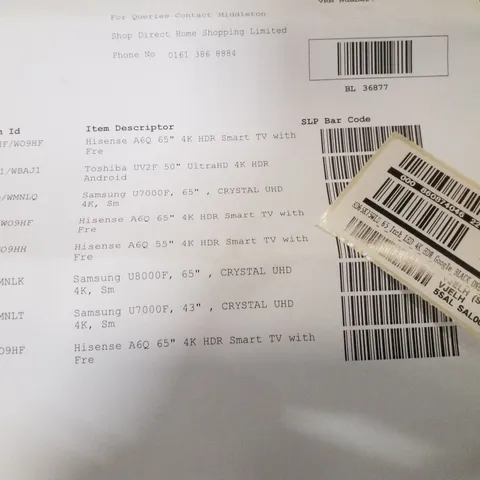 PALLET CONTAINING 9 DAMAGED TVS