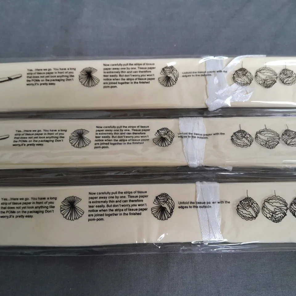 LARGE QUANTITY OF CREAM 15" TISSUE PAPER DECORATIONS