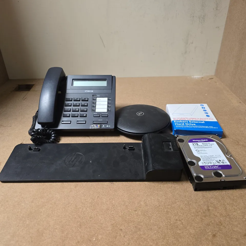 TOTE OF APPROXIMATELY 12 ASSORTED ITEMS TO INCLUDE LG IPECS LANDLINE TELEPHONE, BT HUB, EXTERNAL HARD DRIVE, WESTERN DIGITAL 2TB HARD DRIVE, HP 2013 ULTRASLIM DOCKING STATION ETC