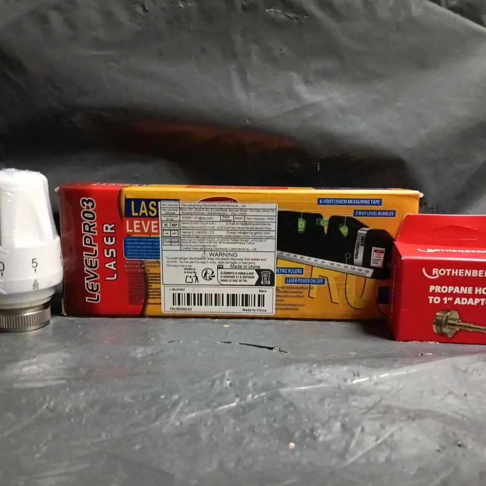 approximately 10 assorted household items to include radiator valve, laser leveller, etc