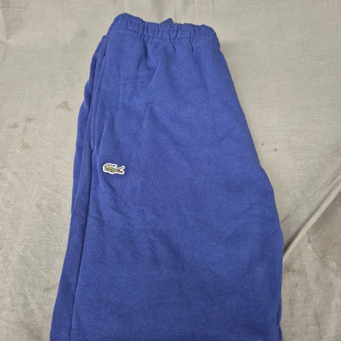 LACOSTE FLEECED TRACKSUIT BOTTOMS IN BLUE SIZE 5