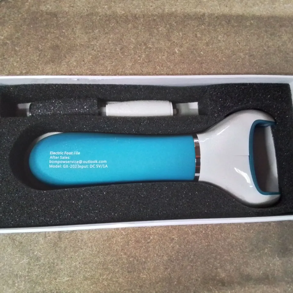 A BOXED ELECTRIC GRINDING MACHINE/ FOOT FILE