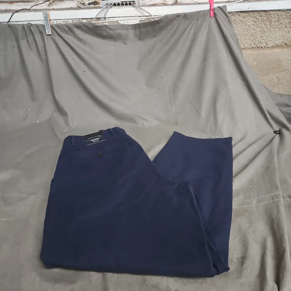 TOMMY HILFIGER W34 X L32 WIDE TAPERED FIT BLUE TROUSERS.