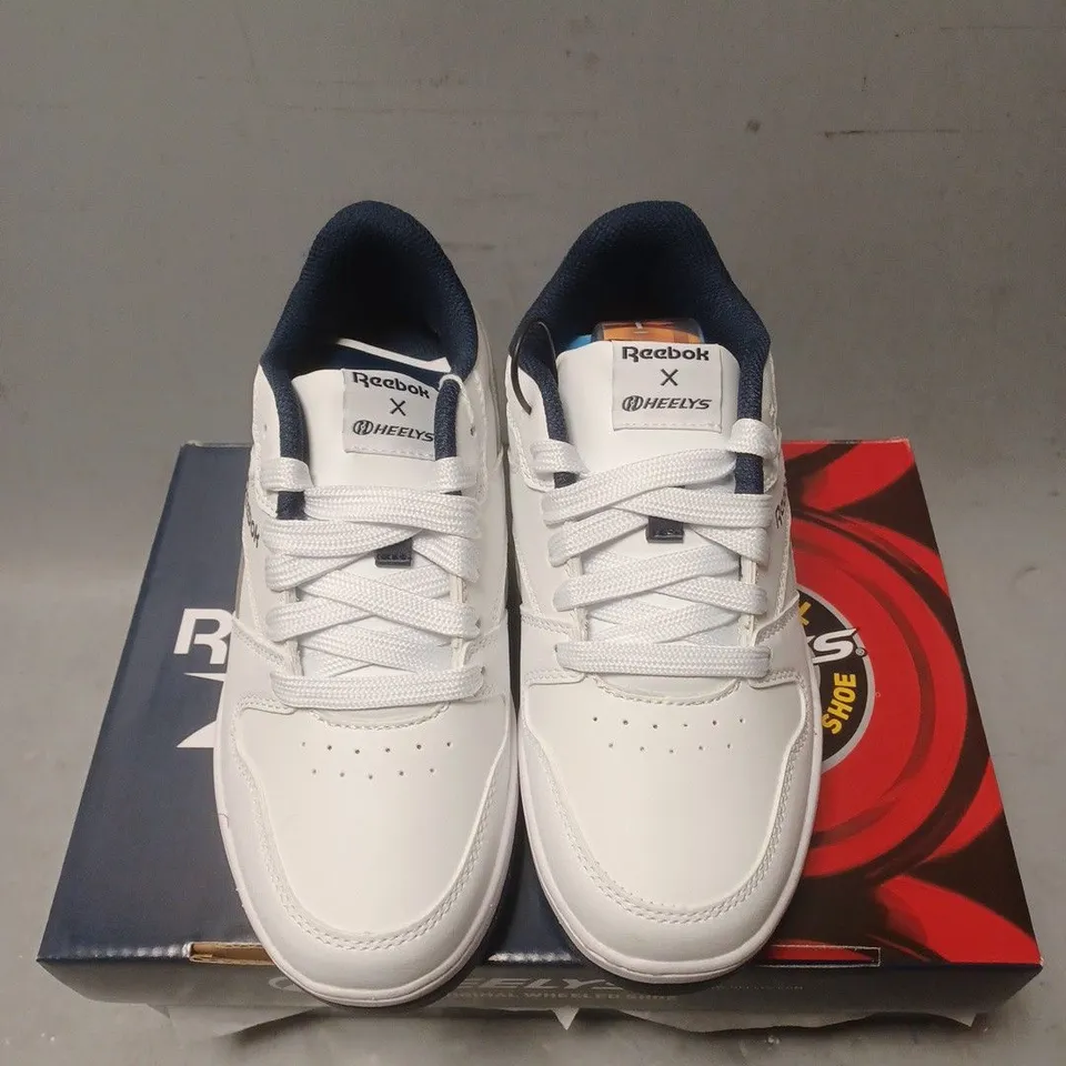 BOXED PAIR OF REEBOK HEELYS - UK SIZE 2