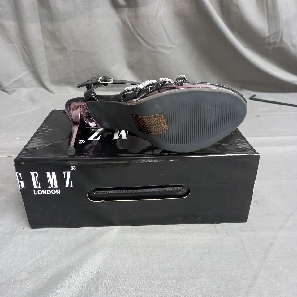 BOX OF APPROXIMATELY 12 PAIRS OF GEMS STRAP RHINESTONE HEELS IN BLACK - VARIOUS SIZES