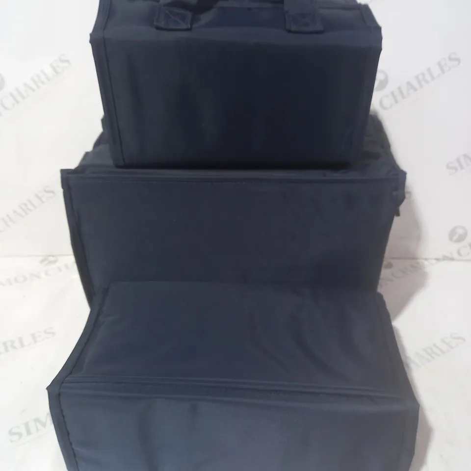 BOXED OUTLET SET OF ROLL UP STORAGE CASES IN NAVY