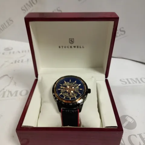 MENβS STOCKWELL AUTOMATIC SPORTS WATCH SKELETON DIAL, BLACK LEATHER STRAP WITH RED DETAILING