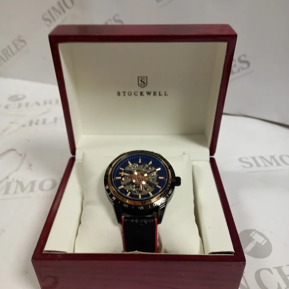 MEN’S STOCKWELL AUTOMATIC SPORTS WATCH SKELETON DIAL, BLACK LEATHER STRAP WITH RED DETAILING