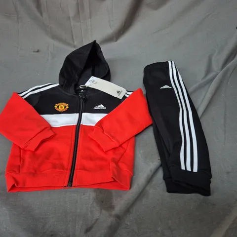 MANCHESTER UNITED TRACKSUIT SIZE 12-18 MONTHS