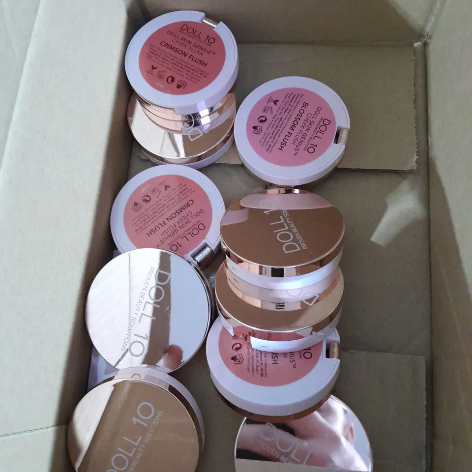 BOX OF APPROXIMATELY 10 MAKEUP PRODUCTS BY DOLL10 TO INCLUDE DIFFERENT SHADES 