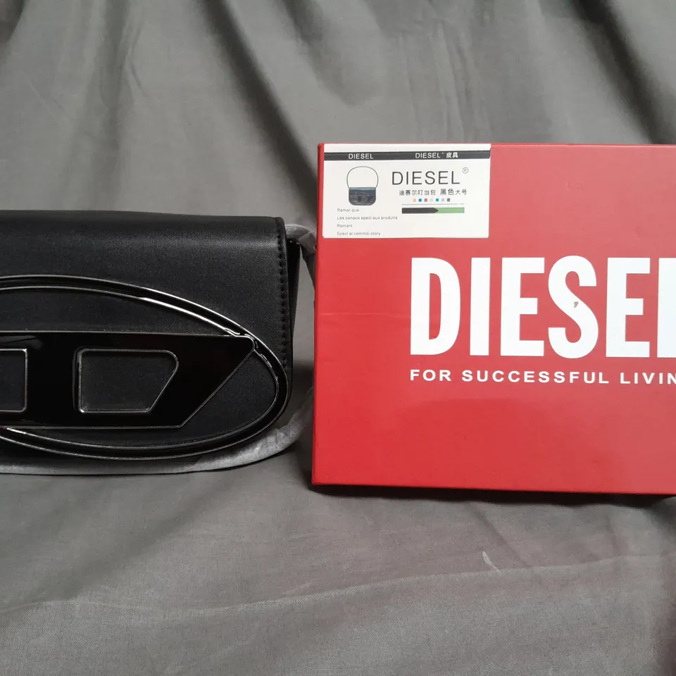 BOXED DIESEL SHORT STRAP CLUTCH HAND BAG IN BLACK