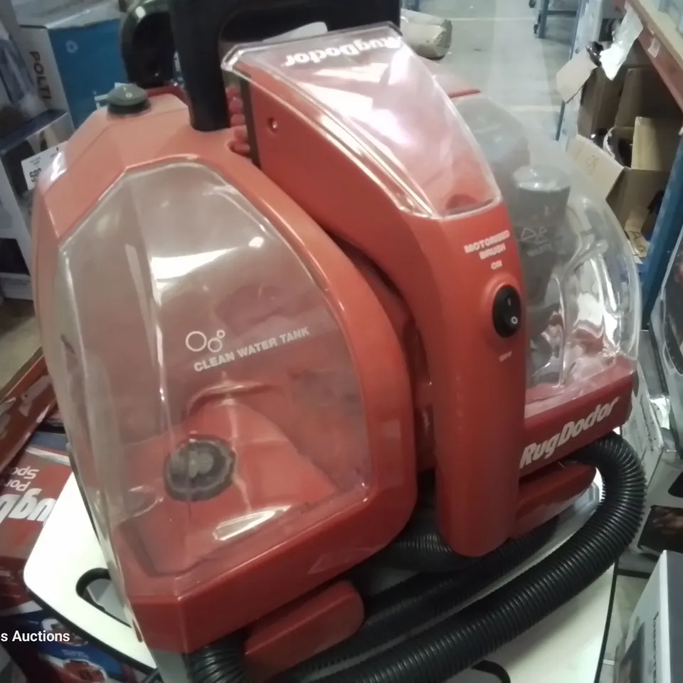 BOXED RUG DOCTOR PORTABLE SPOT CLEANER