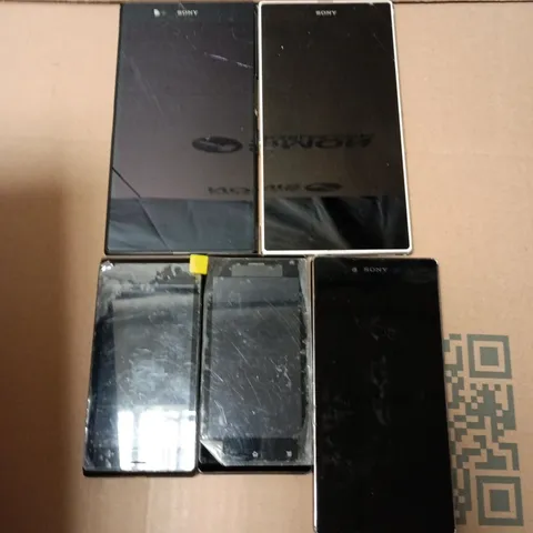 APPROXIMATELY 5 ASSORTED USED PHONES AND PHONE PARTS TO INCLUDE VARIOUS SONY XPERIA MODELS
