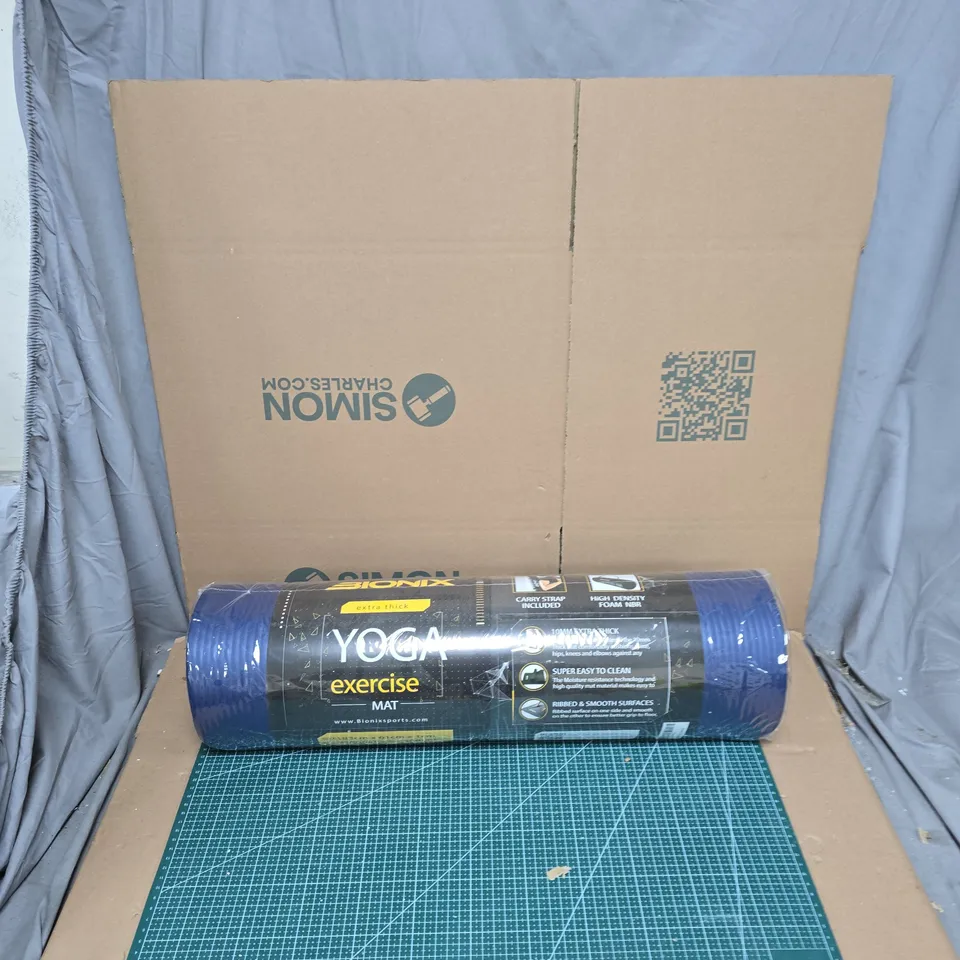 YOGA EXERCISE MAT – BLUE, ROLLED WITH CARRY STRAP